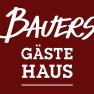 Logo mit dem Text 'Bauers Gästehaus' in Weiß auf dunkelrotem Hintergrund.